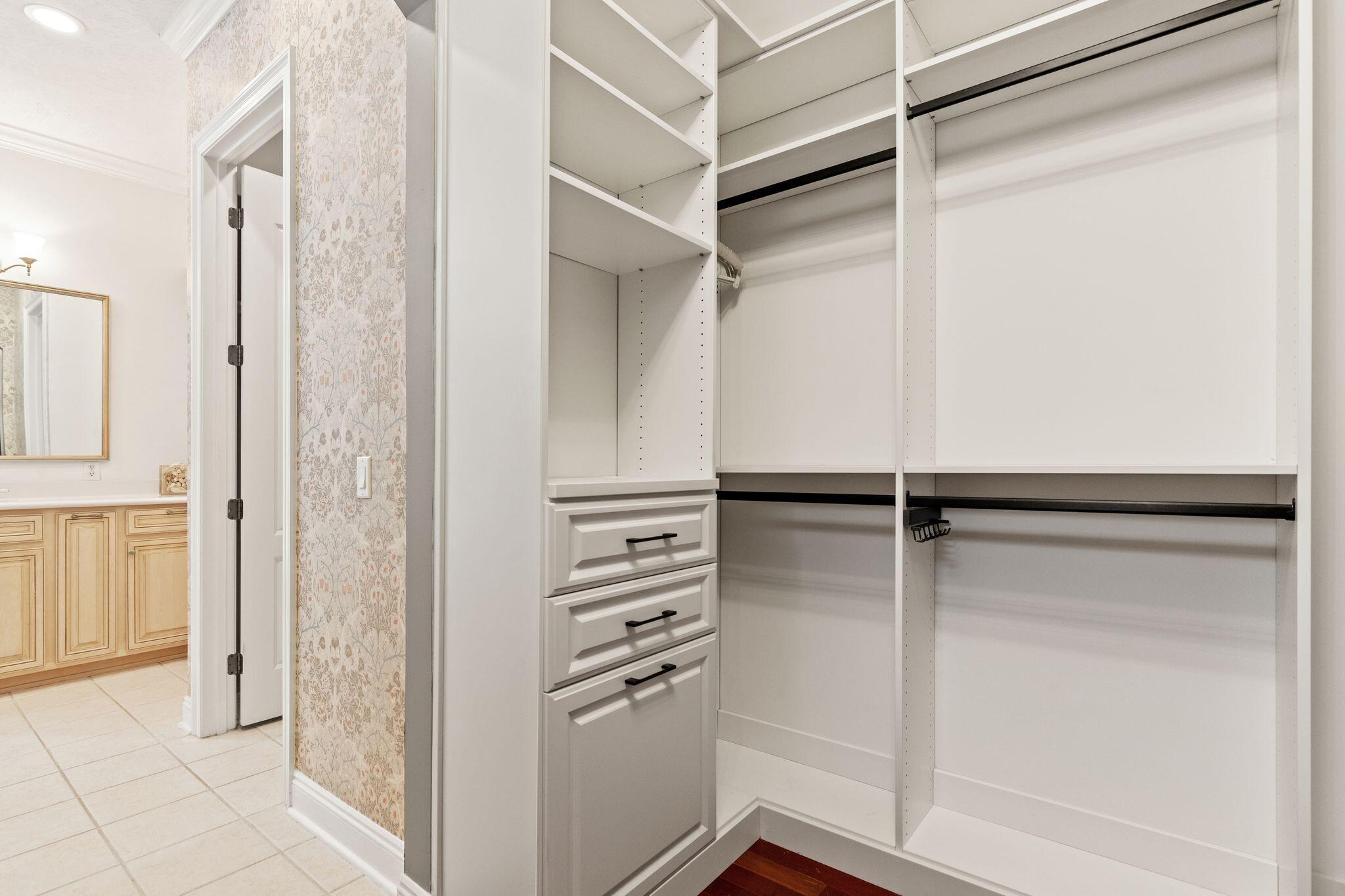 31 Seabreeze Place Inlet Beach, FL 32461 - Photo 17 of 67 a view of walk in closet with empty racks