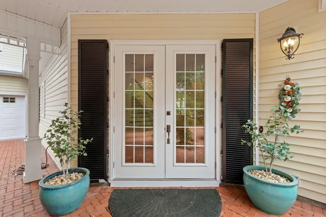 a view of entryway with wooden floor