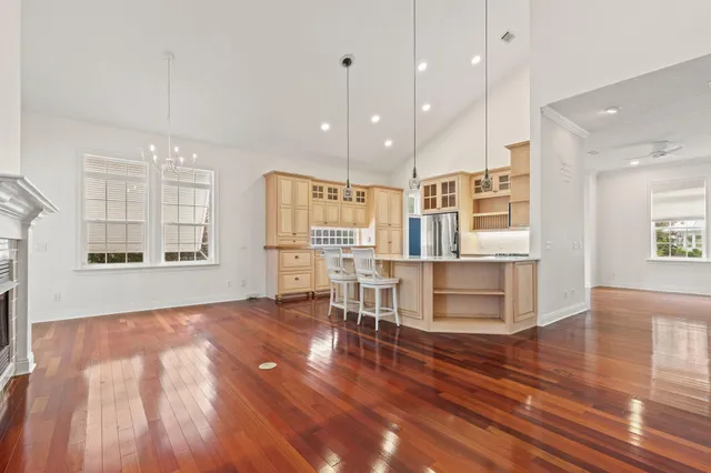 a kitchen with stainless steel appliances a stove a sink and a refrigerator