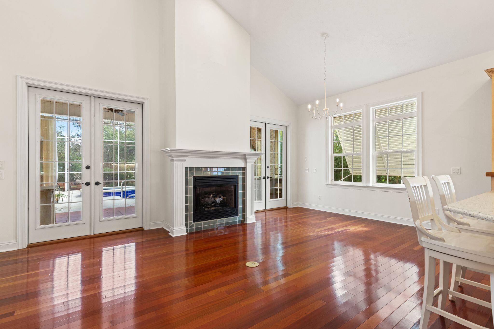 31 Seabreeze Place Inlet Beach, FL 32461 - Photo 25 of 67 a view of empty room with wooden floor and fireplace