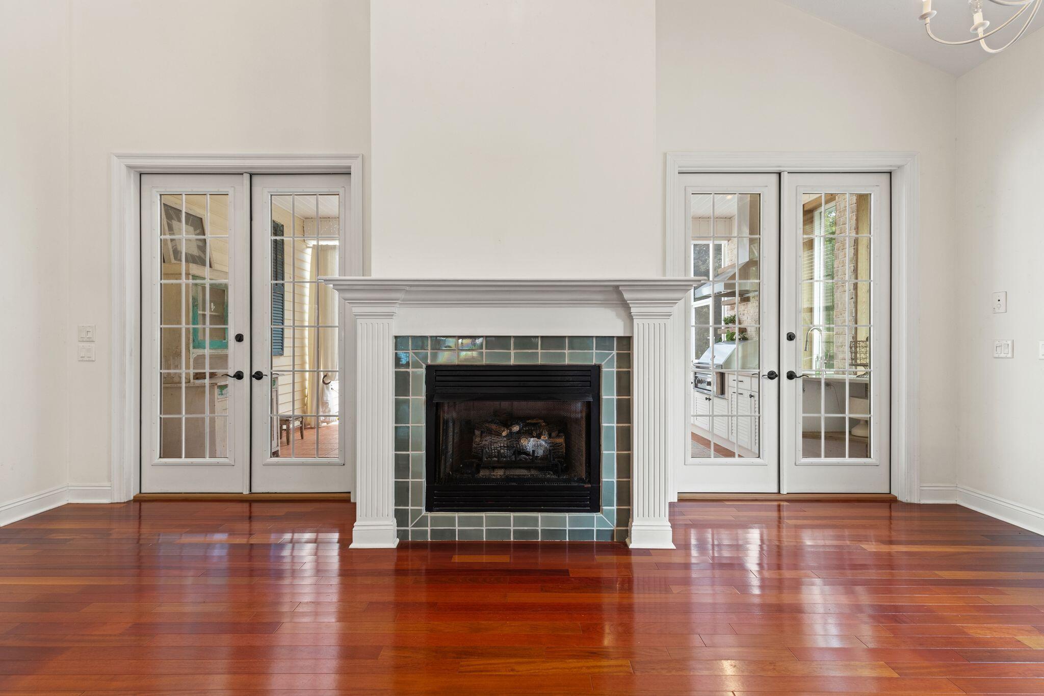 31 Seabreeze Place Inlet Beach, FL 32461 - Photo 28 of 67 a living room with wooden floor and a fireplace