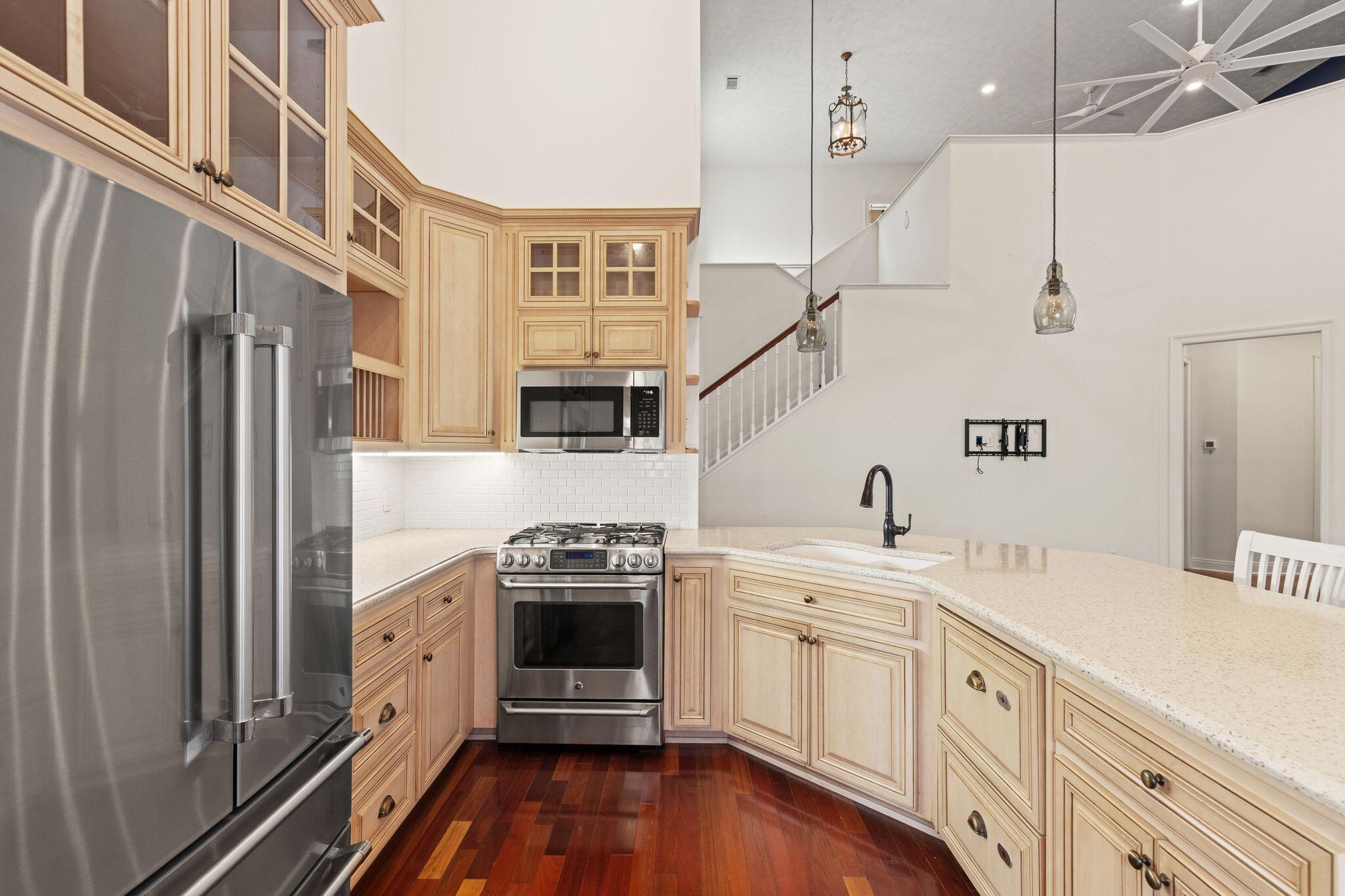 31 Seabreeze Place Inlet Beach, FL 32461 - Photo 31 of 67 a kitchen with stainless steel appliances a stove a sink and a refrigerator