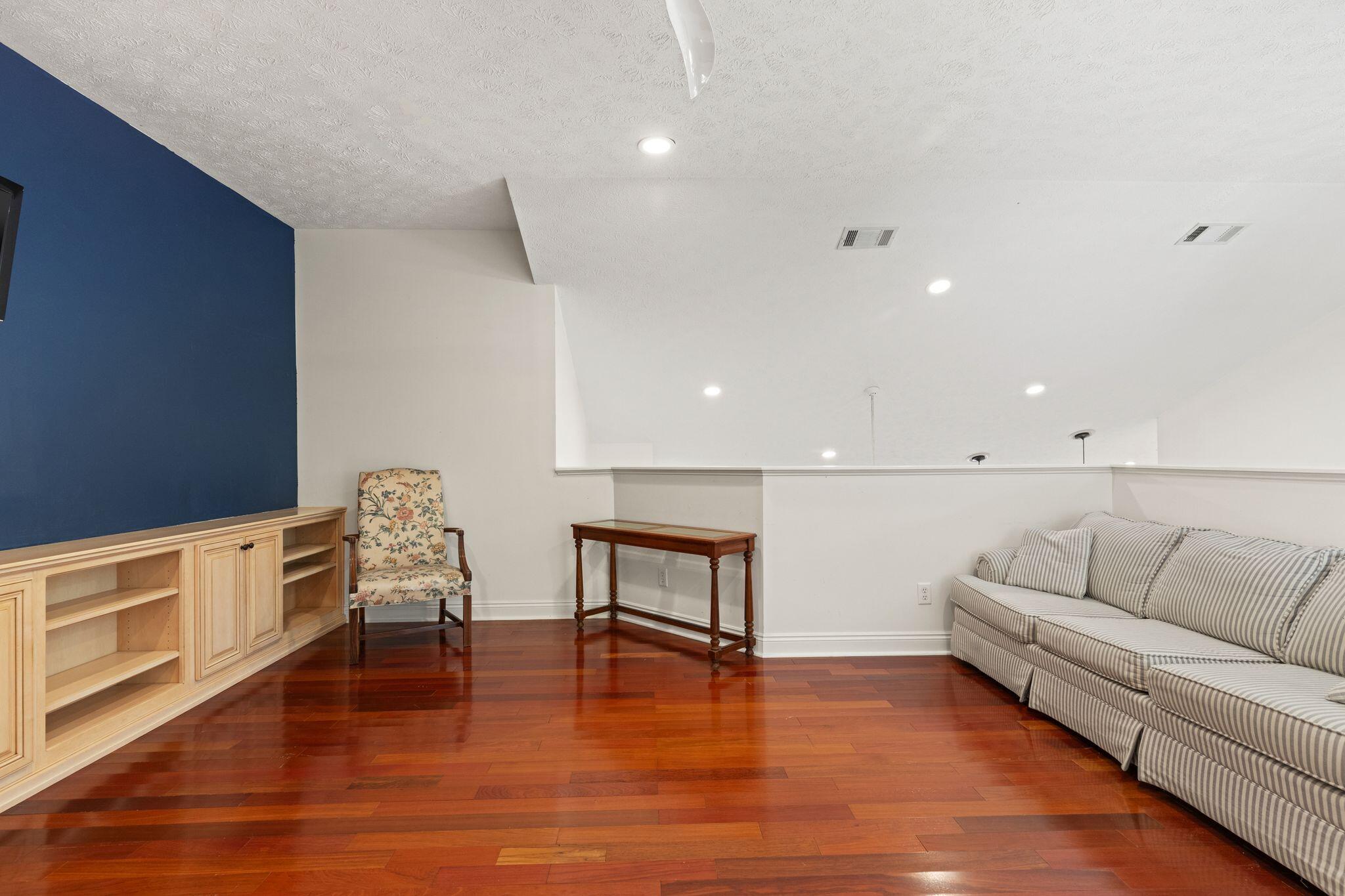 31 Seabreeze Place Inlet Beach, FL 32461 - Photo 33 of 67 a living room with furniture and a wooden floor