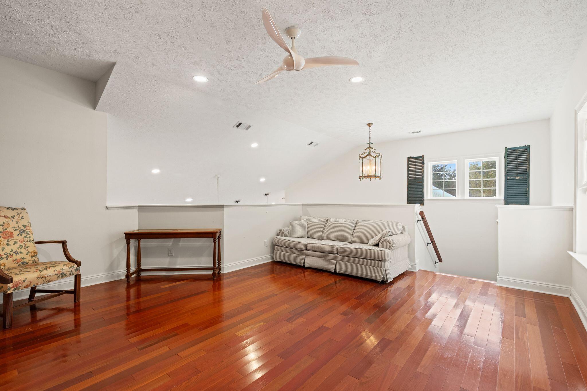 31 Seabreeze Place Inlet Beach, FL 32461 - Photo 34 of 67 a living room with furniture and a wooden floor