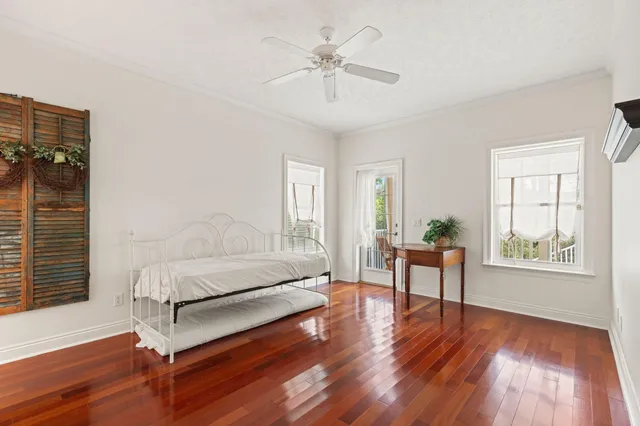 a view of a dining room with furniture and front door