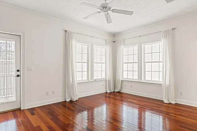 a view of a swimming pool with a lounge chair