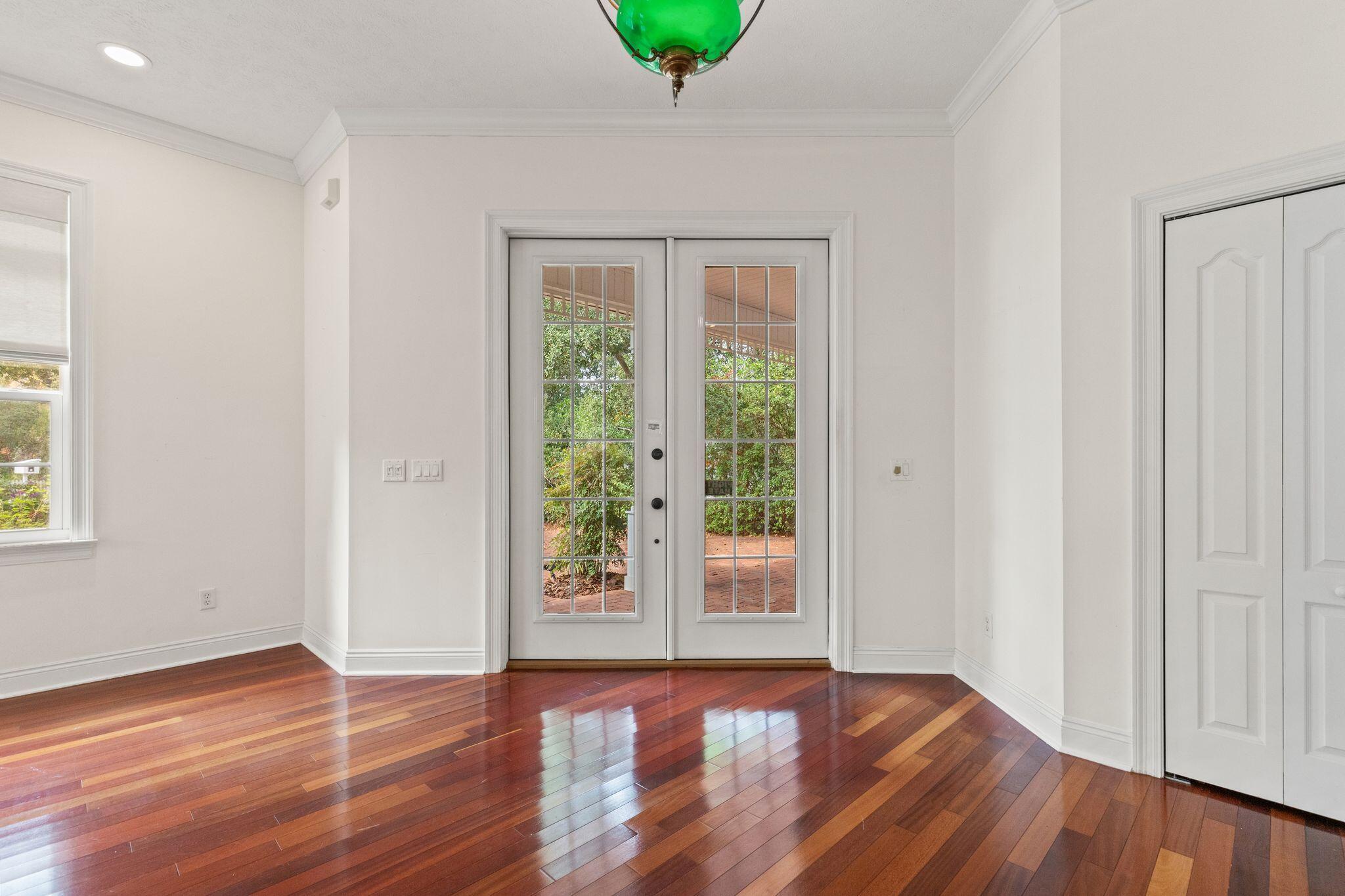 31 Seabreeze Place Inlet Beach, FL 32461 - Photo 4 of 67 a view of an empty room with wooden floor and a window