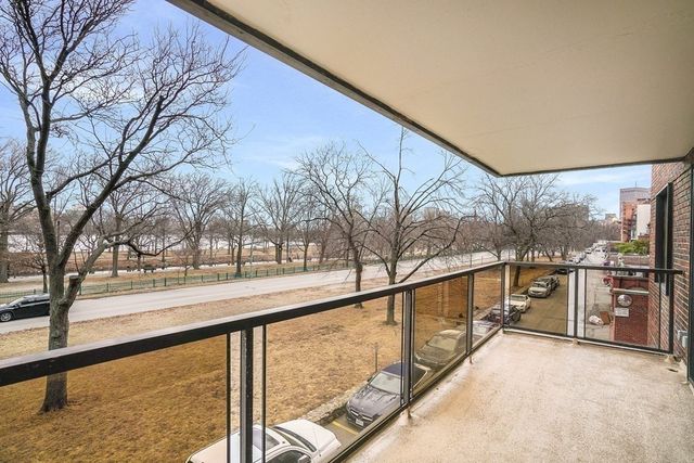a view of a balcony with an outdoor space