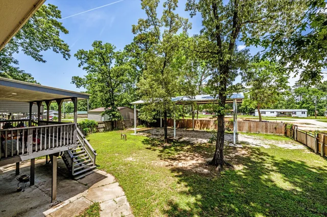 a view of a swimming pool with a patio