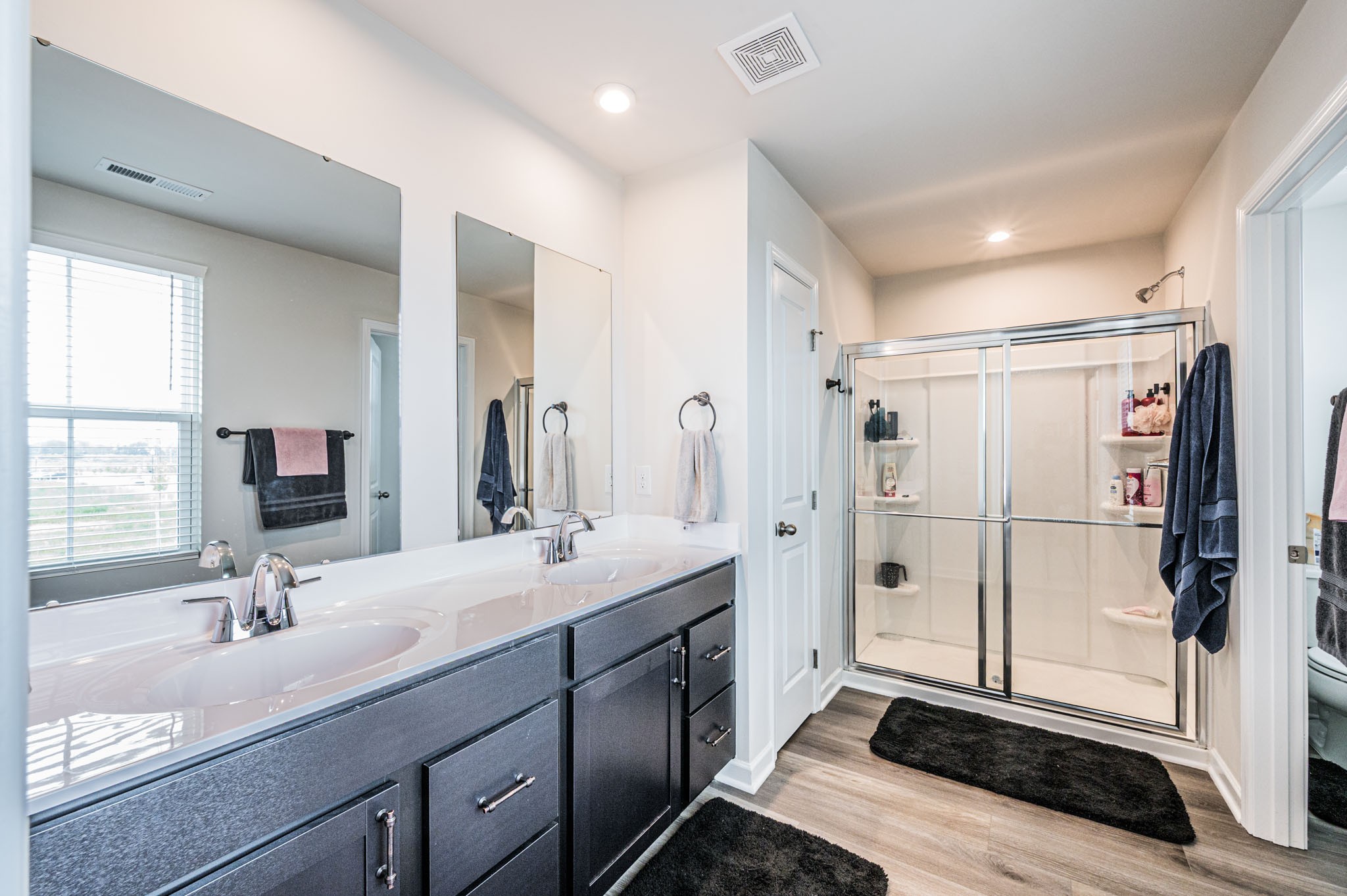 119 Amberleaf Circle Franklin, KY 42134 - Photo 22 of 28 a spacious bathroom with a double vanity sink mirror and shower