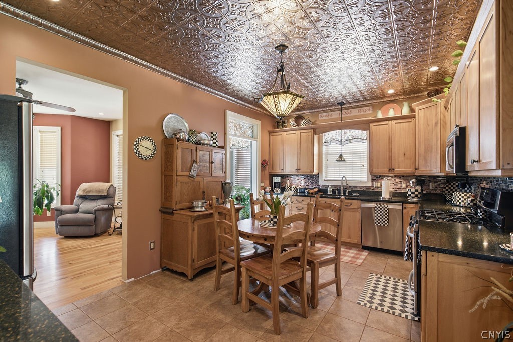 321 West Lake Road Oswego, NY 13126 - Photo 12 of 49 Charming kitchen highlighted by beautiful woodwork