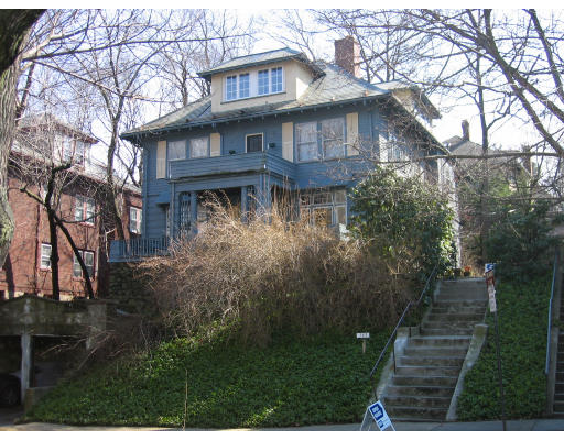 145 University Road, Unit 1 Brookline, MA 02445 - Photo 1 of 1 a view of a house with brick walls