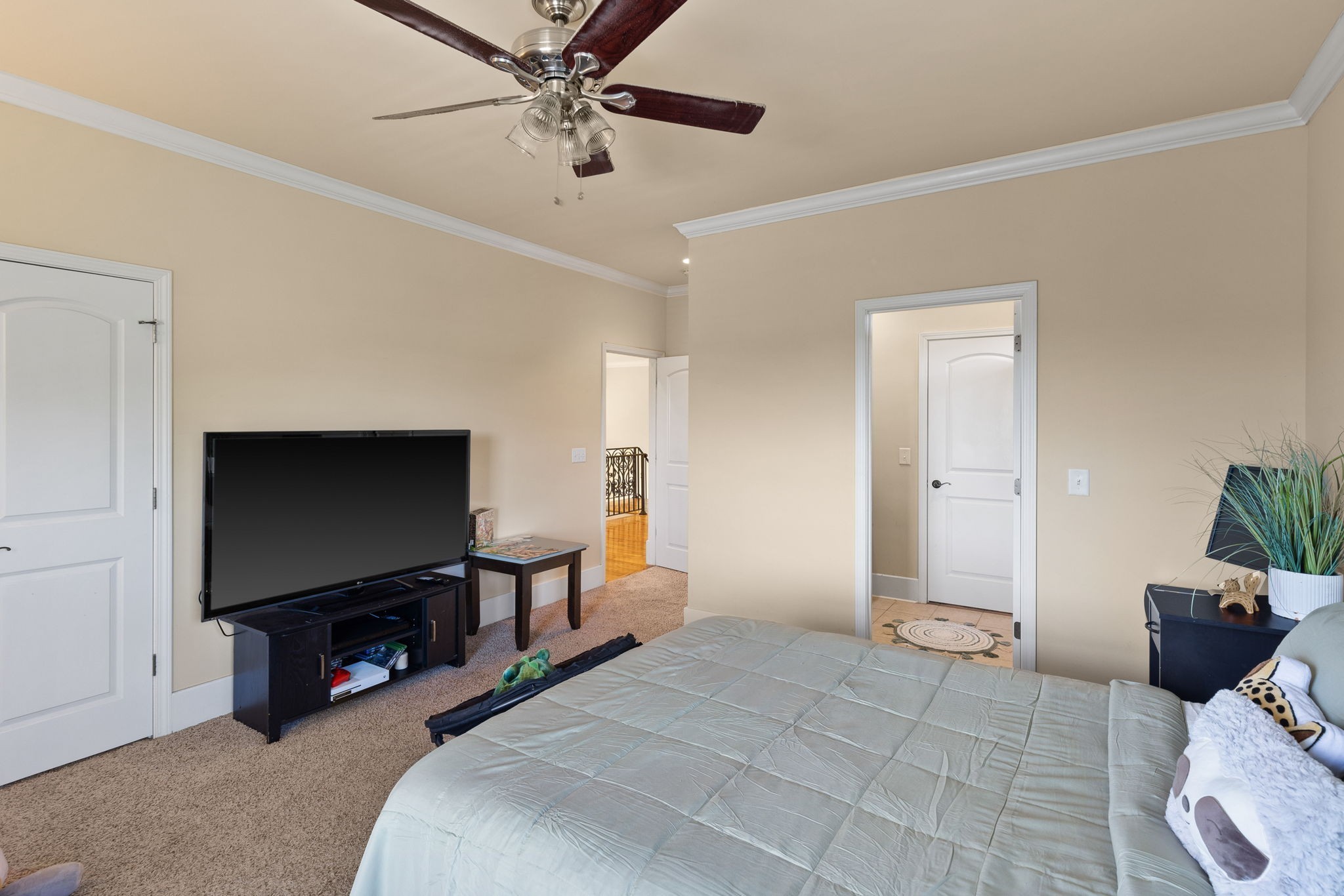 8288 Guthrie Road Cross Plains, TN 37049 - Photo 35 of 94 a bedroom with a bed and a flat screen tv
