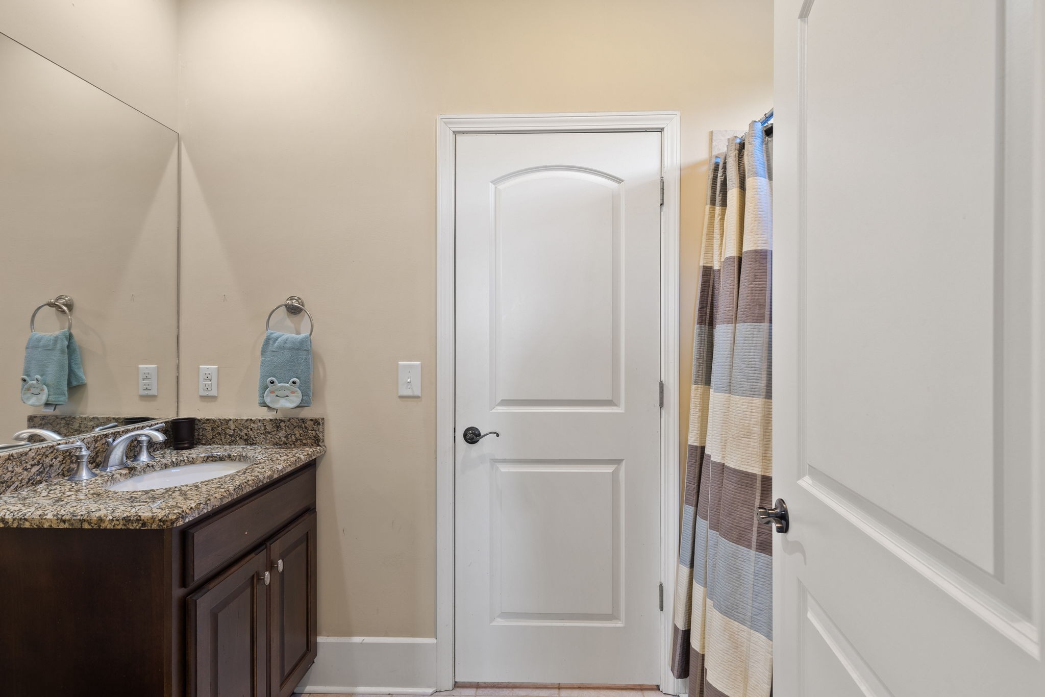 8288 Guthrie Road Cross Plains, TN 37049 - Photo 38 of 94 a bathroom with a granite countertop sink and a mirror