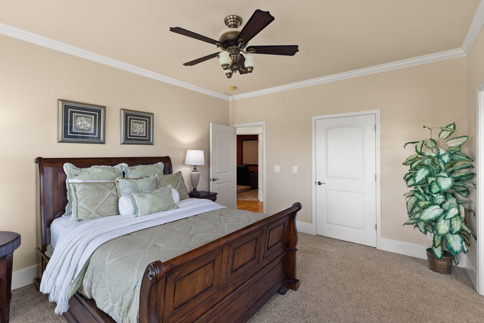 8288 Guthrie Road Cross Plains, TN 37049 - Photo 39 of 94 a bedroom with a bed and a potted plant