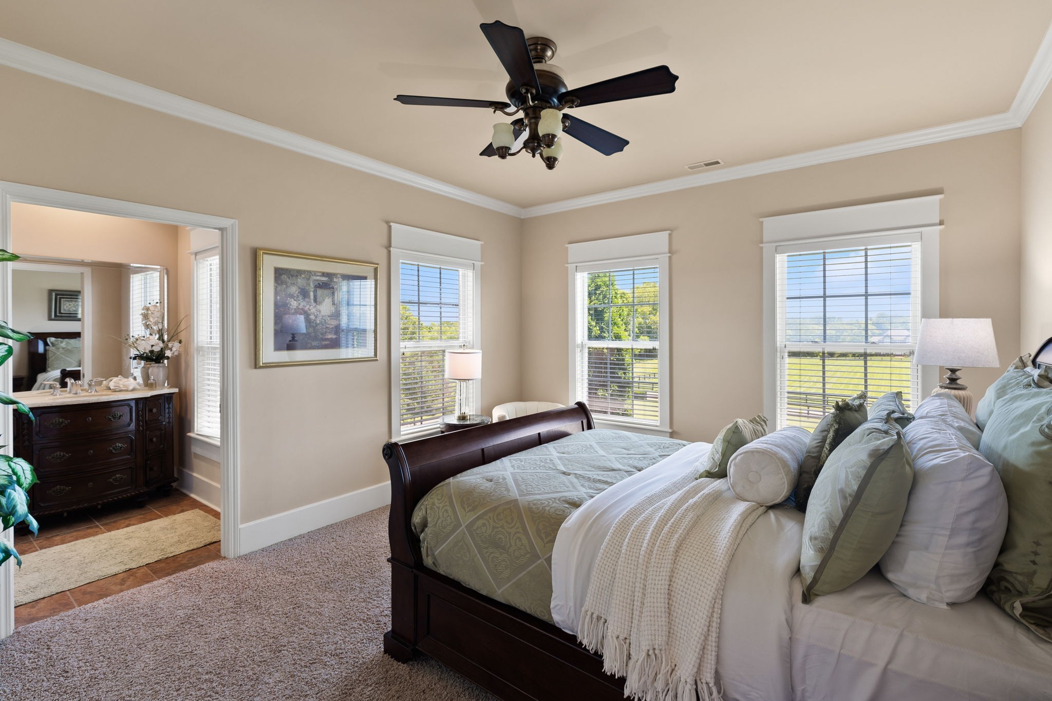 8288 Guthrie Road Cross Plains, TN 37049 - Photo 41 of 94 a bedroom with a bed and a chandelier