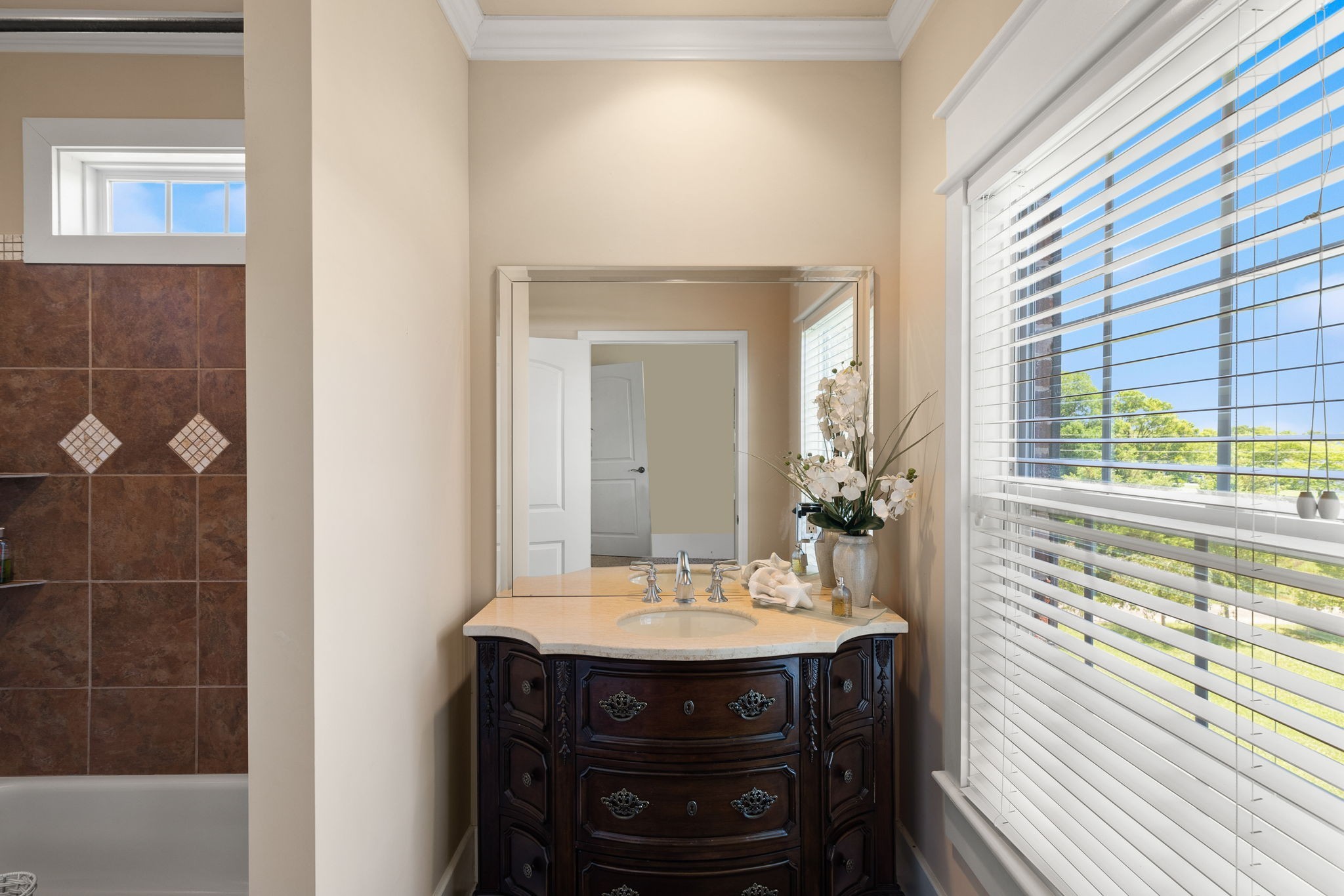 8288 Guthrie Road Cross Plains, TN 37049 - Photo 42 of 94 a bathroom with a sink and a mirror