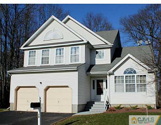 78 Springfield Road North Brunswick, NJ 08902 - Photo 16 of 19 a front view of a house with a yard