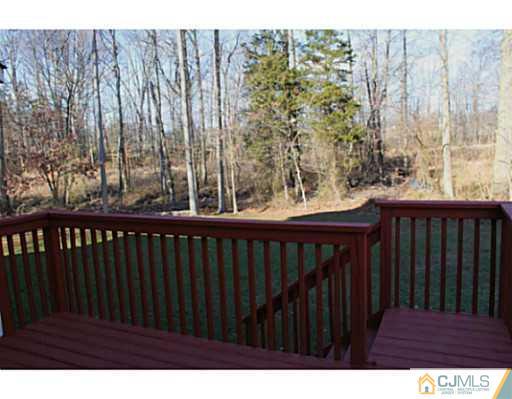 78 Springfield Road North Brunswick, NJ 08902 - Photo 18 of 19 a balcony with wooden floor