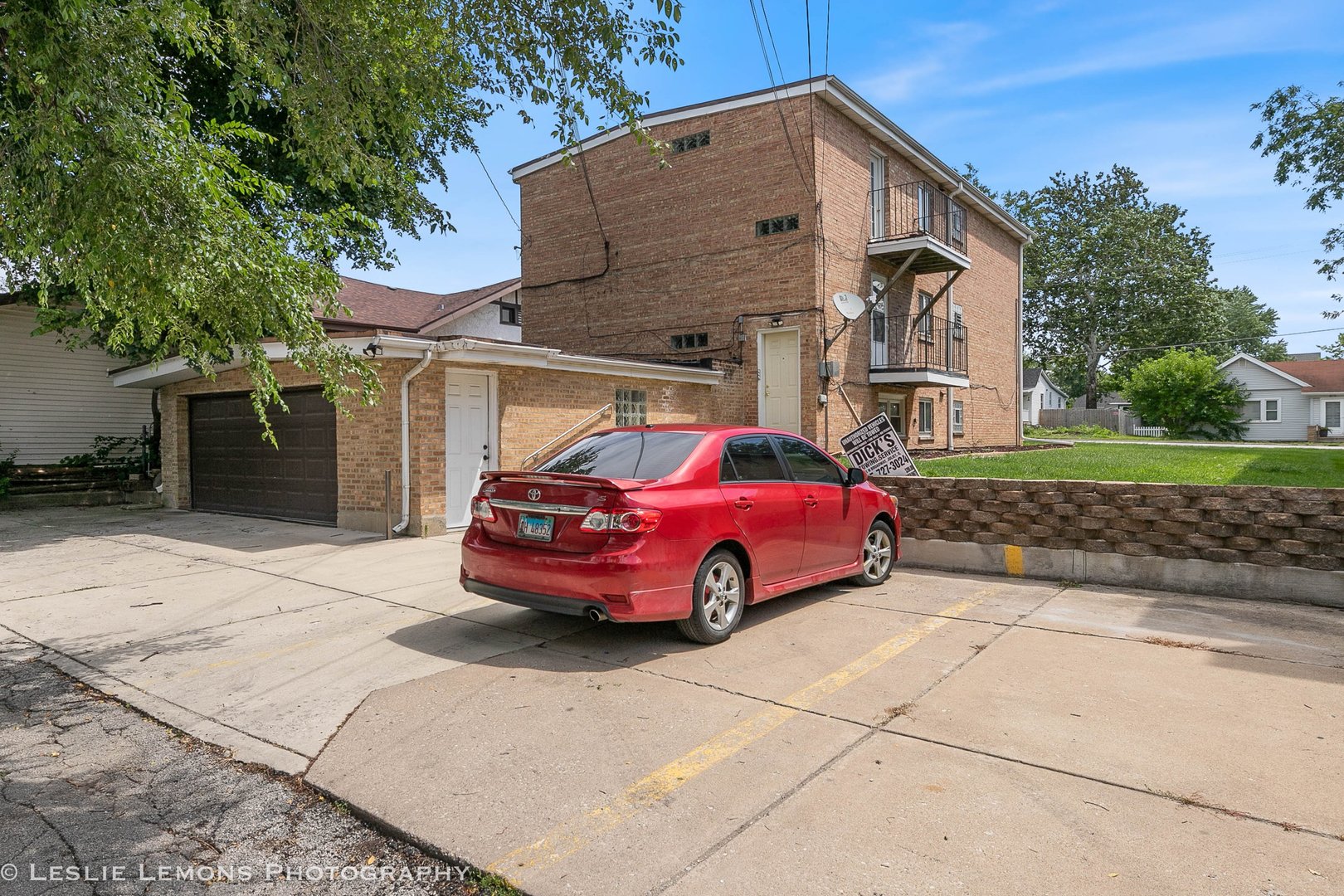 912 State Street, Unit 2 Lemont, IL 60439 - Photo 22 of 25 a front view of a house with a garden