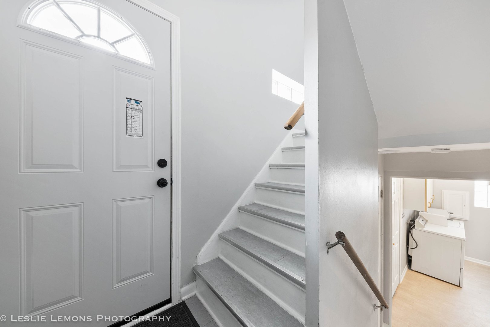 912 State Street, Unit 2 Lemont, IL 60439 - Photo 24 of 25 a view of a hallway with staircase