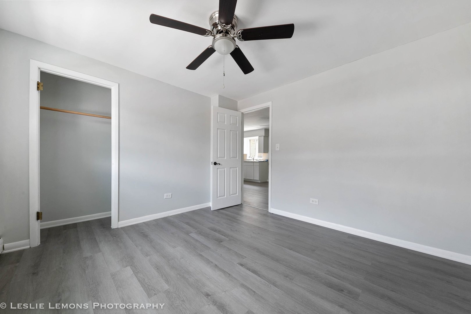 912 State Street, Unit 2 Lemont, IL 60439 - Photo 8 of 25 wooden floor in an empty room