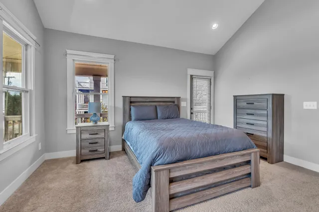 a bedroom with a bed and closet