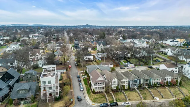 a view of a balcony with yard