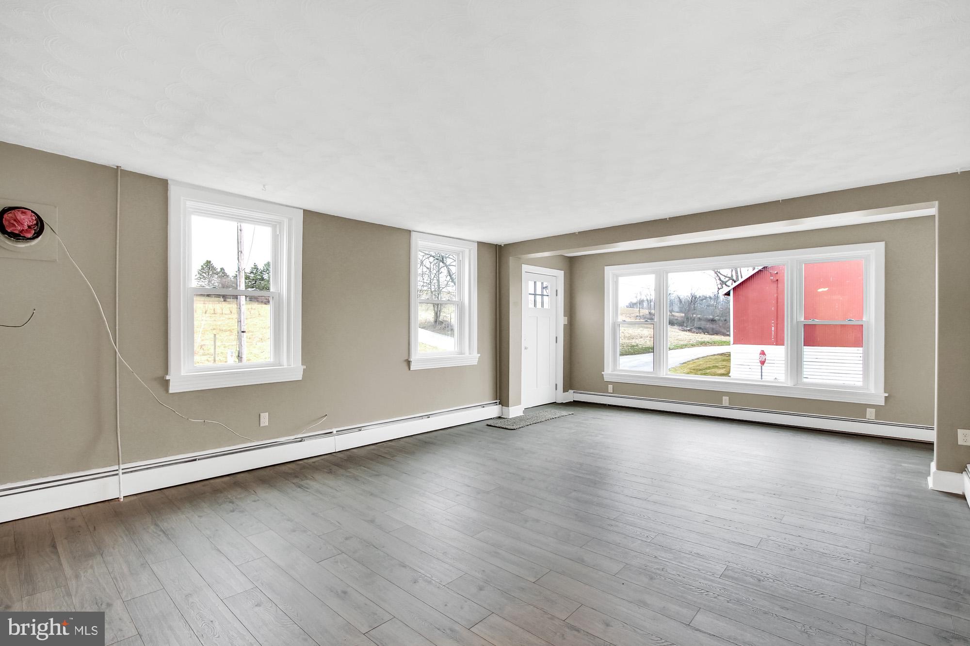 8865 Camp Road Red Lion, PA 17356 - Photo 9 of 28 Gorgeous Living room with tons of light!