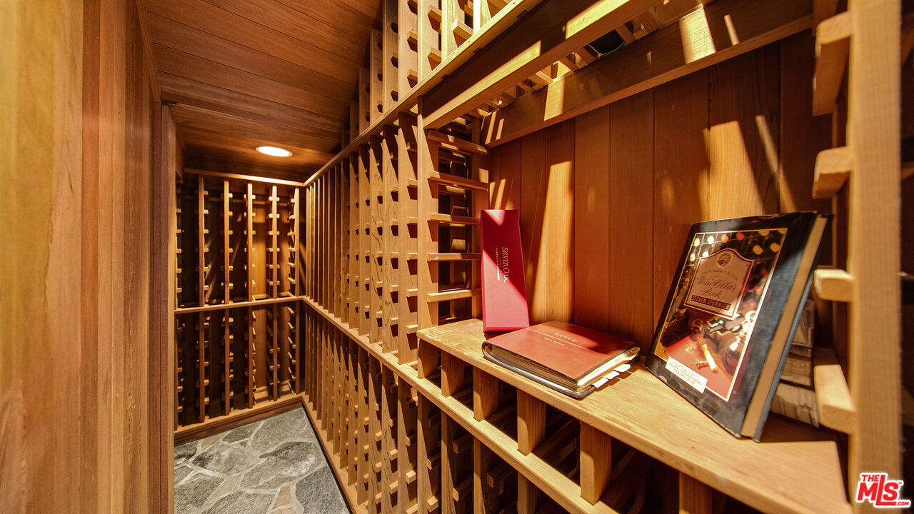 2312 Kimridge Road Beverly Hills, CA 90210 - Photo 47 of 60 a view of an entryway with wooden floor
