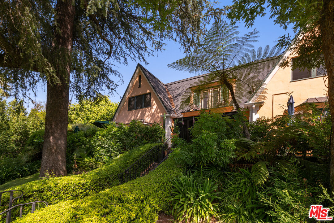 1954 Hillcrest Road, Unit 3 Los Angeles, CA 90068 - Photo 1 of 26 a view of a house with a yard