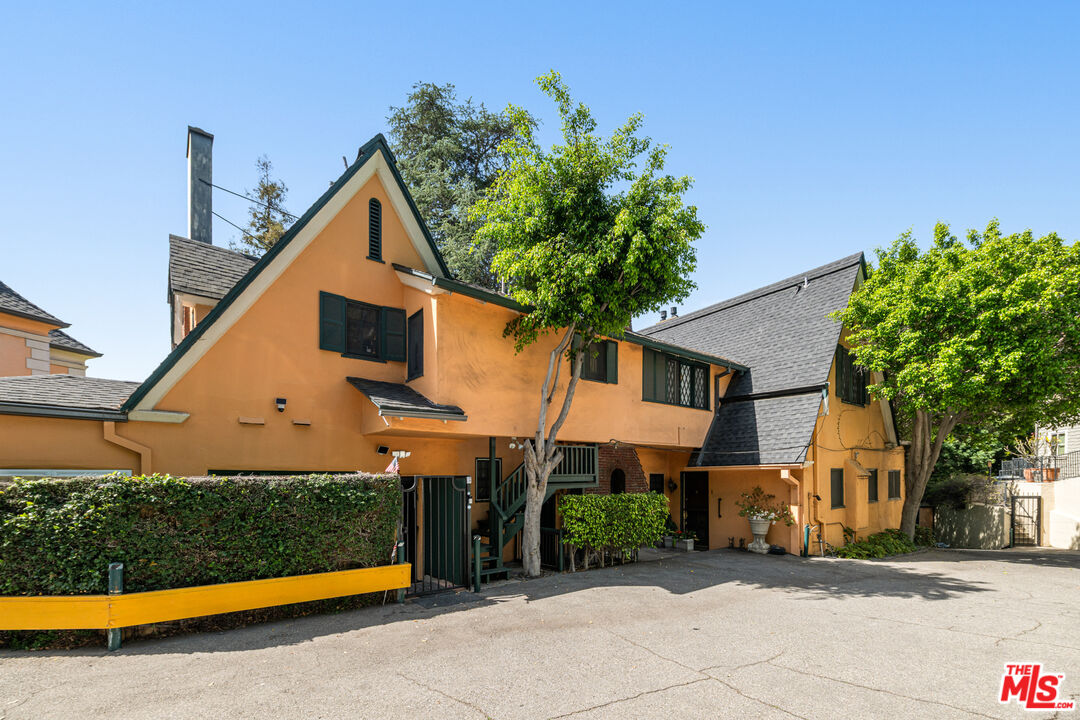 1954 Hillcrest Road, Unit 3 Los Angeles, CA 90068 - Photo 2 of 26 a front view of a house with a yard