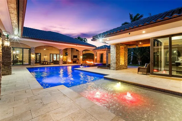 a view of a big room with a chandelier