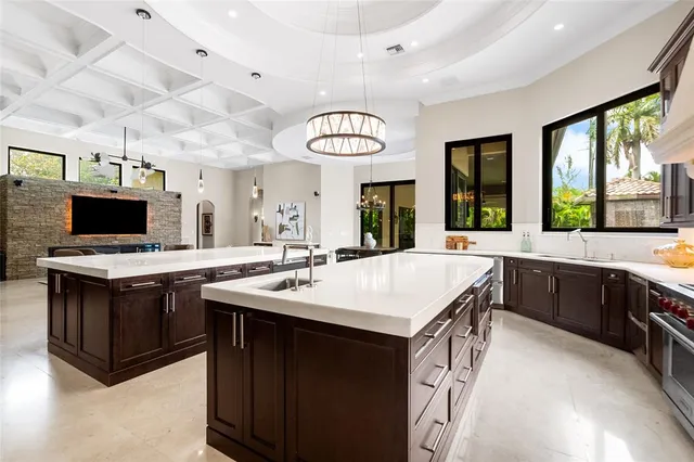 a bedroom with a large bed and a large window