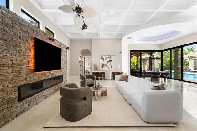 a spacious bathroom with a tub sink and mirror