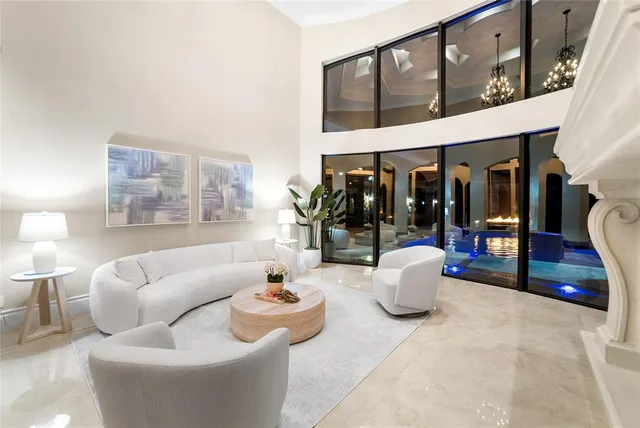 a bedroom with furniture and a wooden floor