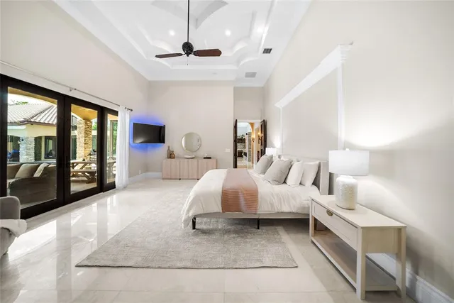 a kitchen with a refrigerator a stove a microwave and island with wooden floor