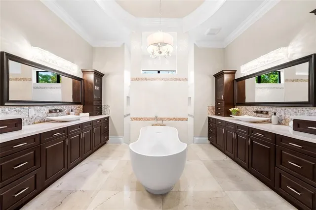 a kitchen with a stove a sink and a refrigerator