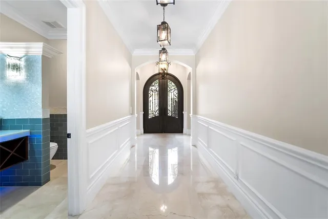 a view of a house with entrance gate
