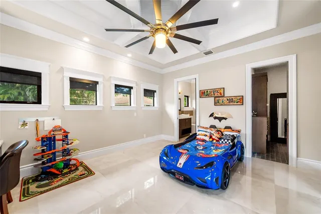 a bathroom with a sink a large mirror and a bathtub