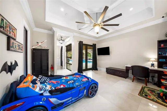 a living room with fireplace furniture and a flat screen tv