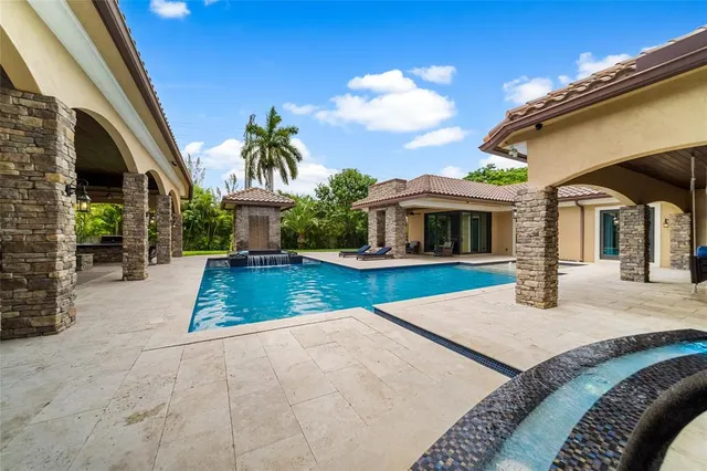 a view of potted plants next to a building