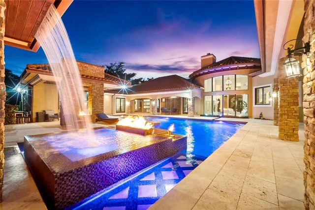 a view of a building with swimming pool