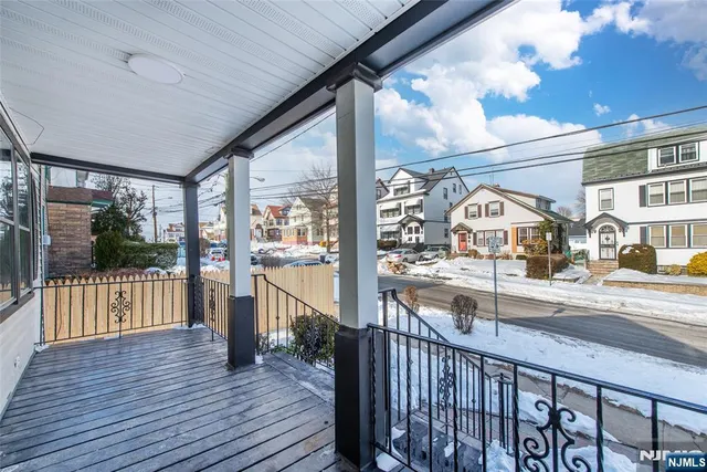 a view of balcony with furniture