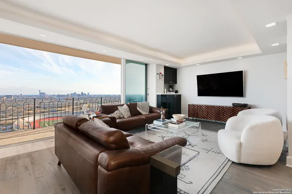 a bed room with a bed and a flat screen tv