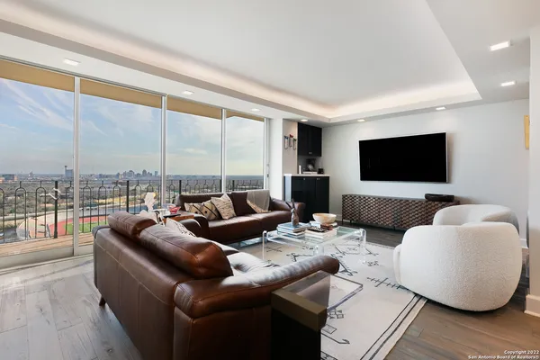 a bedroom with a bed and a lamp on table