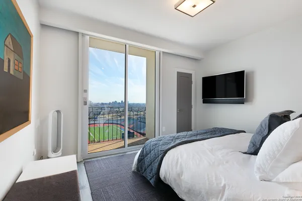 a bathroom with a double vanity sink mirror and