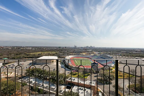 a bed room with a bed and a television