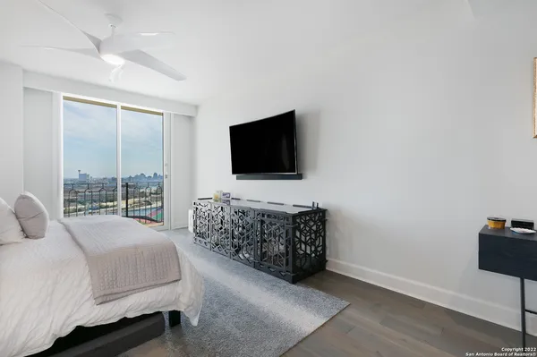 a bathroom with a double vanity sink toilet and shower