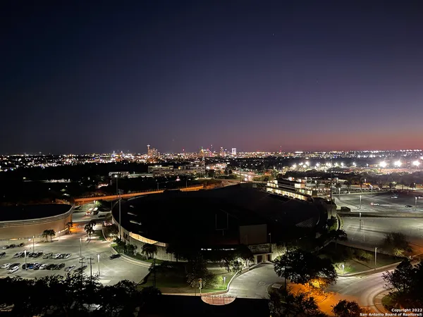a view of a house with backyard and porch